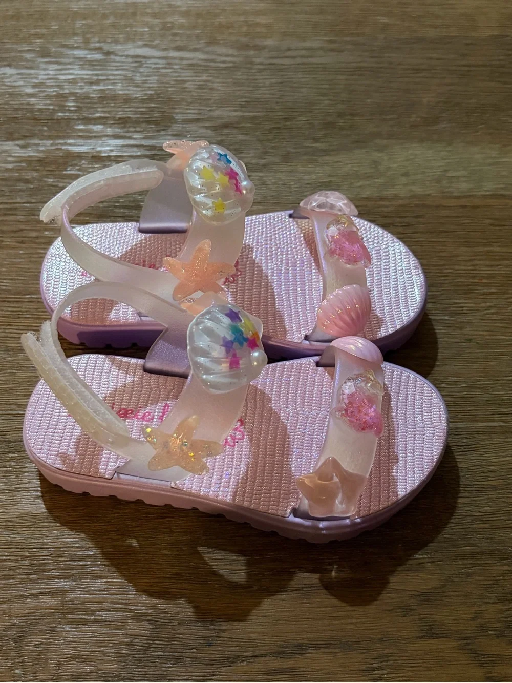 Girls Pink Jelly Sandals with Sea Charm Embellishments
